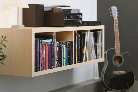 Books, LPs, turntable and guitar